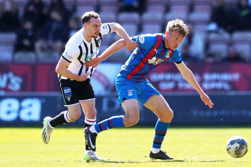 Chris Hamilton tries to win the ball back for Dunfermline Athletic FC.