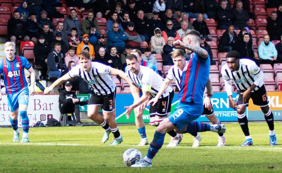 Billy Mckay fires in his penalty for Inverness Caley Thistle.