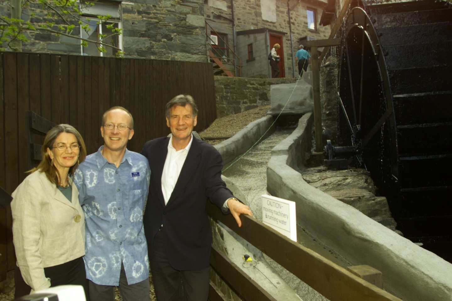 Michael Palin with Aberfeldy Watermill owners Jayne Ramage and Kevin Ramage.