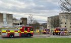 Fire crews at Earn Crescent on Thursday after a flat fire