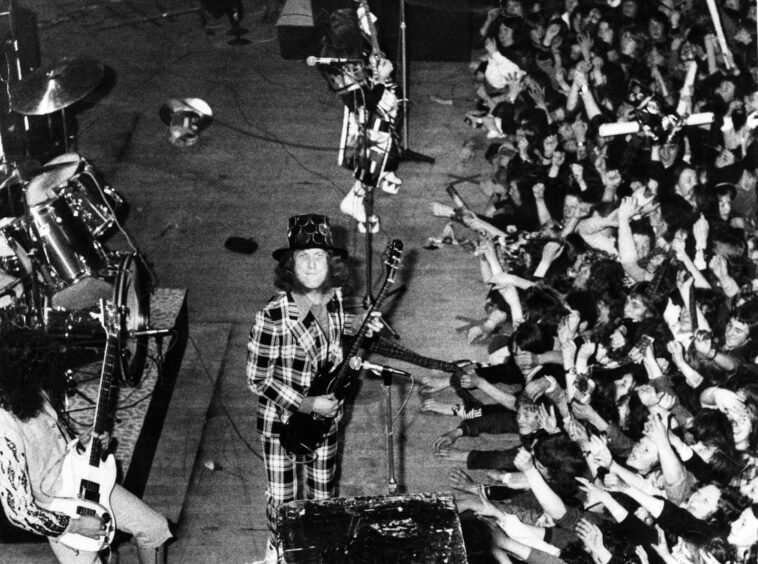 Slade frontman Noddy Holder looks towards the camera during the Caird Hall gig.