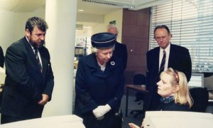 The Queen with teaching assistance Elizabeth Gibb at the University of Abertay library. Looking on is principal Professor Bernard King (left).