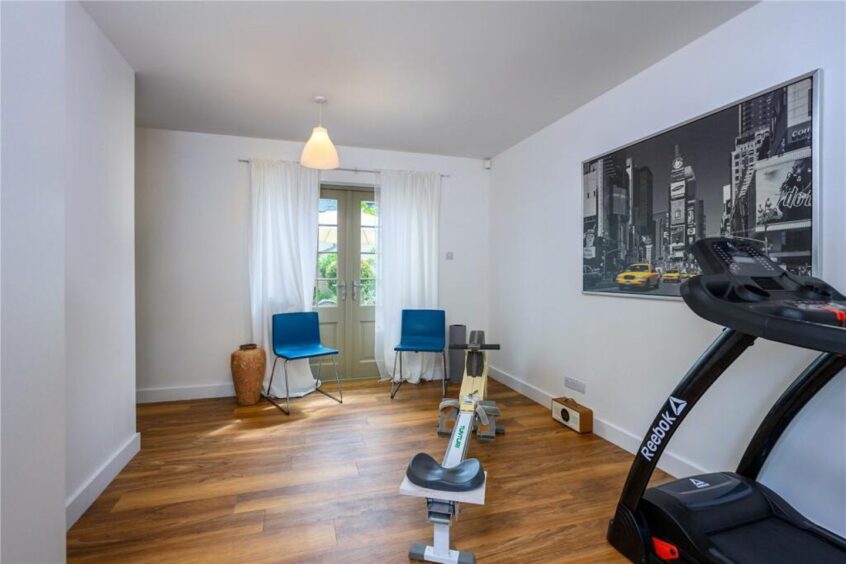One bedroom in the St Andrews home is currently used as a gym. Image: Savills 