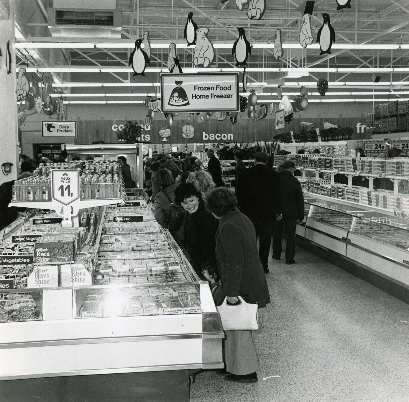 Shoppers browsing the frozen foods in the Kirkton Asda