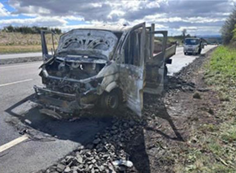 The burnt out van after fire on A9 north of Perth 