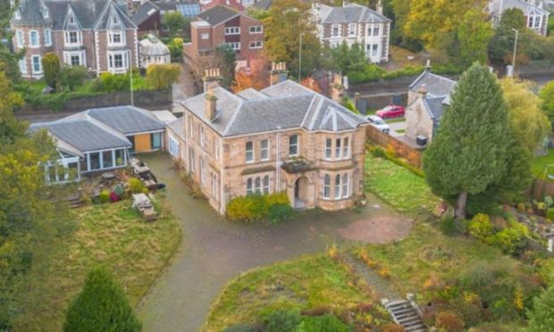 Aerial shot of the property and the surrounding grounds.