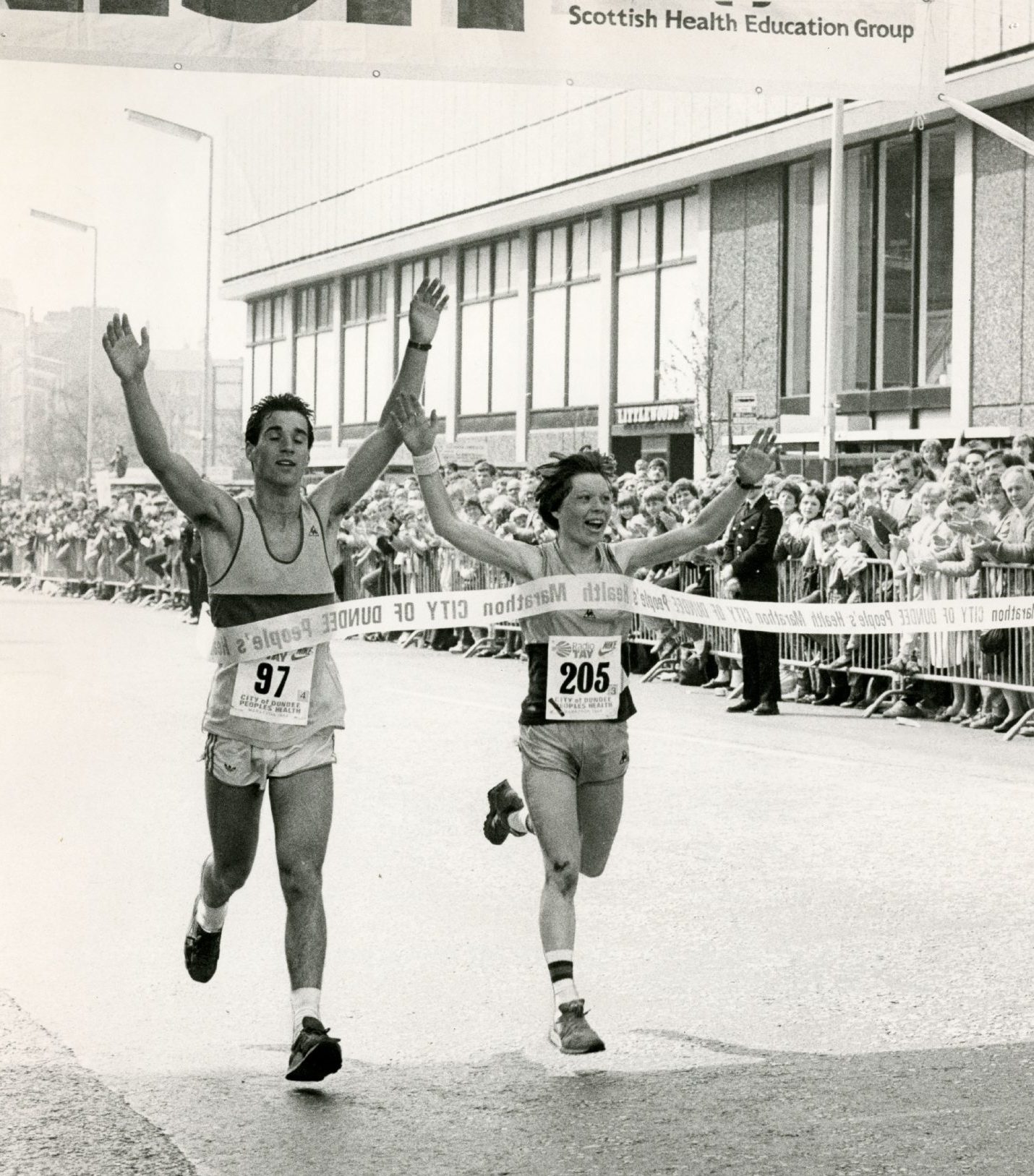 Margaret Baillie coming over the finish line as the fastest woman in the 1984 Dundee marathon