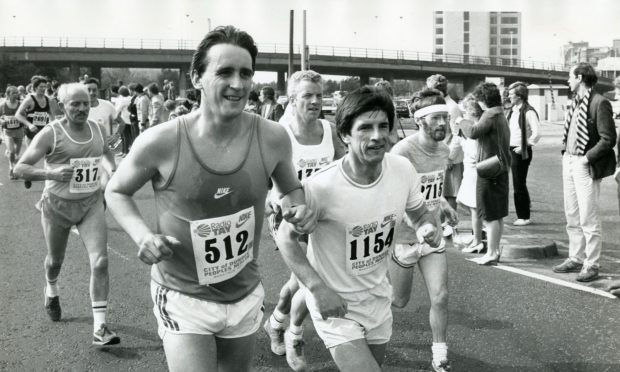Marathon runners pounding Dundee's streets in 1984.