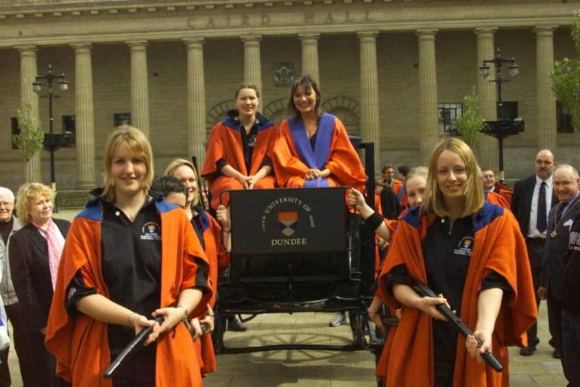 New rector Lorraine Kelly is taken from the City Square on the Dundee University carriage.