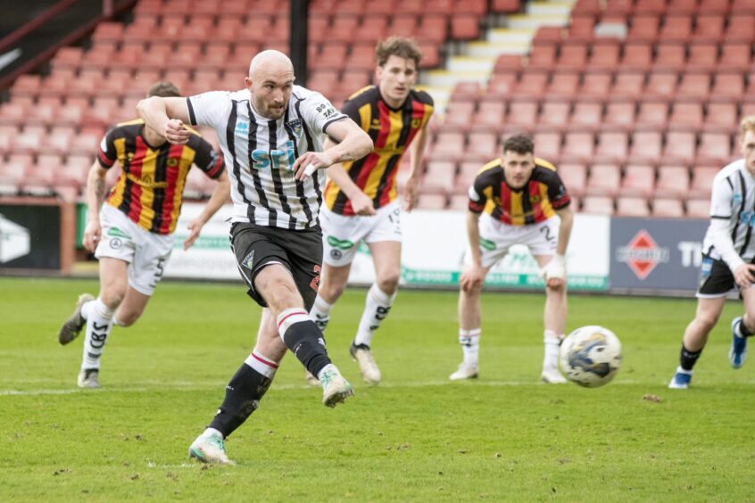 Chris Kane fires the ball at goal from the penalty spot as he scores for Dunfermline against Partick Thistle.