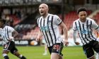 Chris Kane roars with delight after scoring for Dunfermline Athletic F.C.