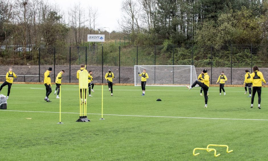 Dunfermline Athletic FC players are put through their paces at the club's new training ground.