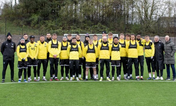 Dunfermline Athletic FC players and staff at their new training facility in April.