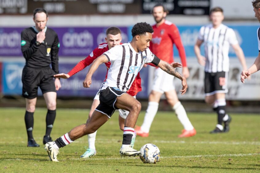Kane Ritchie-Hosler gets on the ball for Dunfermline Athletic F.C. against Queen's Park.