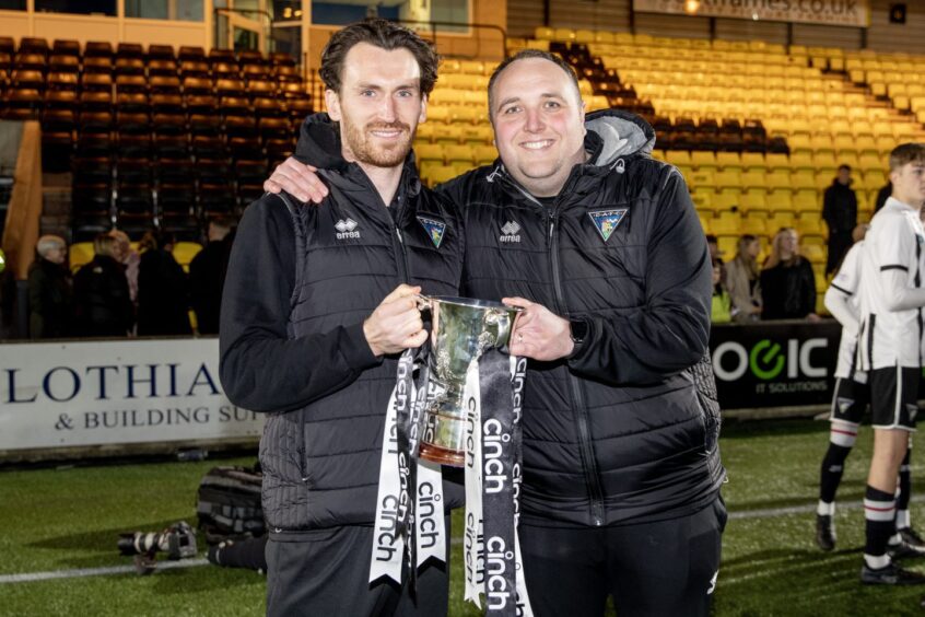 Dunfermline midfielder Joe Chalmers and reserve coach Gary Montignani with the Reserve Cup.