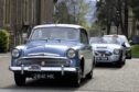 classic cars driving into Crieff Hydro Hotel grounds