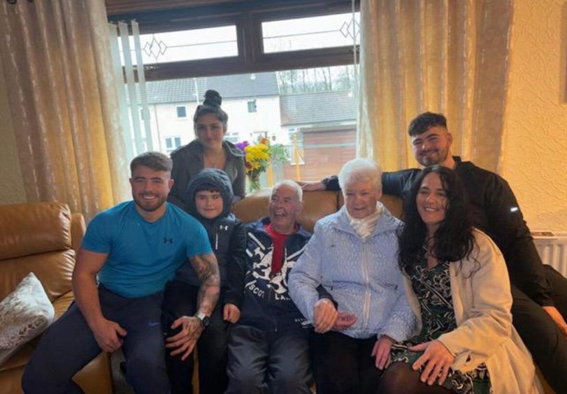 Davie Murray with his family as grandson arrange Rangers applause
