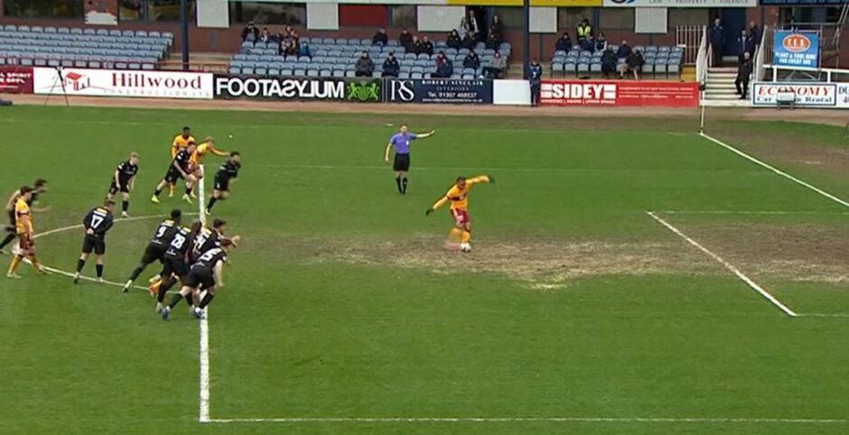 Georgie Gent (top) and Dundee players encroach as Theo Bair hits the penalty. Image: BBC Scotland