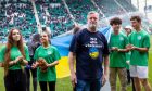 Steven Carr on the Easter road pitch with the Dnipro Kids not long after they were evacuated from Ukraine in 2022. Image: Steven Carr