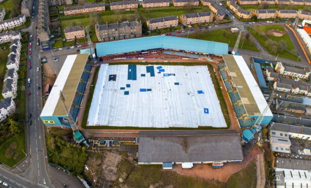 Drone footage shows that Dundee have protected their pitch with covers. Image: Paul Vinova.