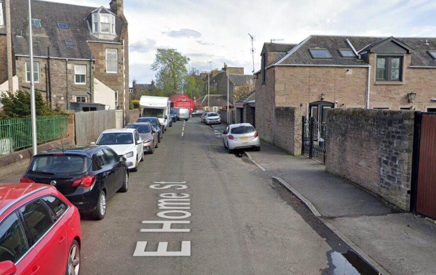 East Home Street in Broughty Ferry where cars are parked on the pavement 