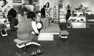 Children being fitted for shoes in the Dundee shop in 1989.