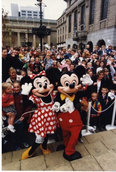 Minnie and Mickey Mouse at the opening of the Disney Shop.