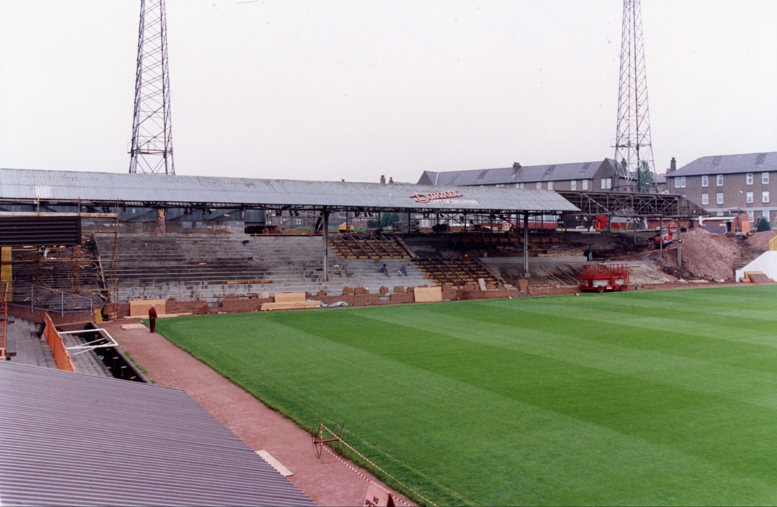 The new all-seater stand emerging from the rubble of The Shed