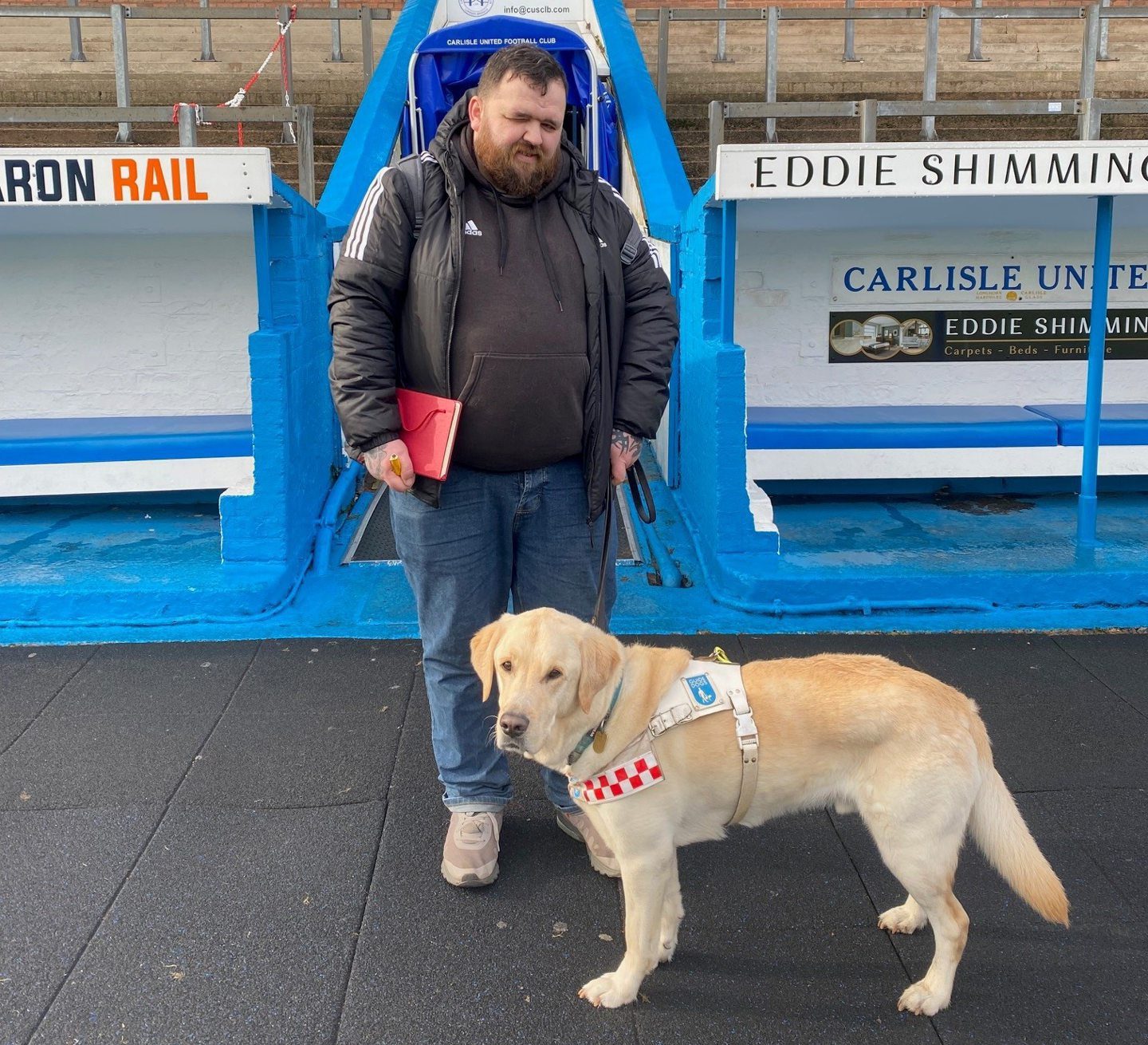 Jonathan Attenborough with guide dog Sam.