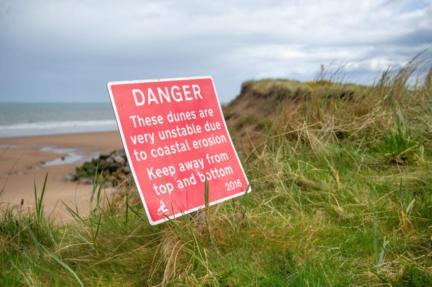 Montrose beach coastal erosion warning signs