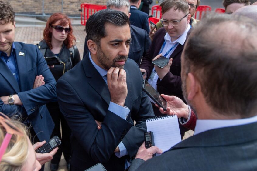 Humza Yousaf speaking with the press about his future as first minister. 