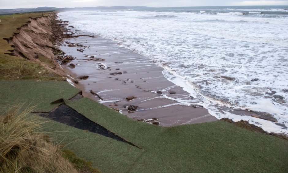 The sand dunes at Montrose on the left of the picture and the sea on the right