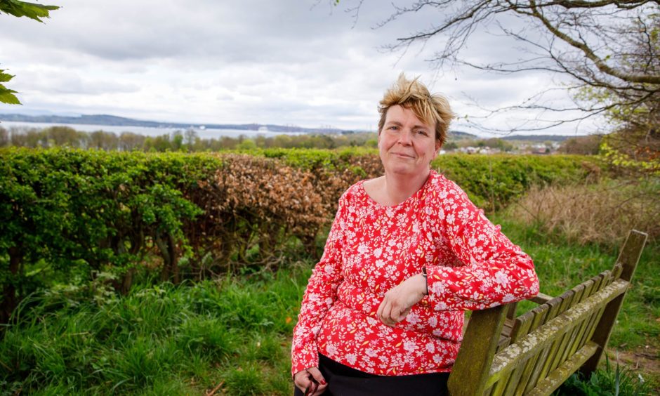 Brigid Dalby stops for a break on her walk along The Avenue. 