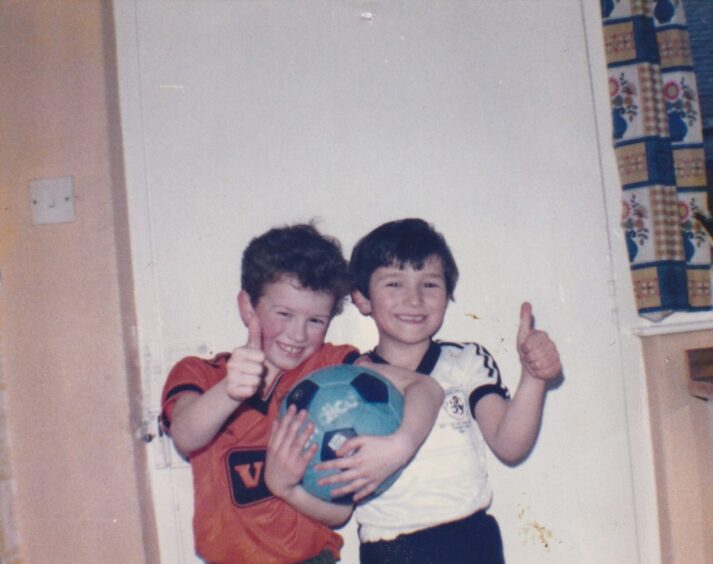 Neil Forsyth, left, and pal Roger Kay wearing Dundee United kit when they were children