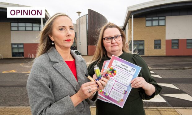 To go with story by Rebecca Baird. RB vaping schools column Picture shows; St Paul's RC Academy head teacher Kirsty Small with Sarah Anderson, Educational Support Worker with the information leaflets and vapes found at the school./RB quote card. St Paul's Dundee. Supplied by Image: Alan Richardson/DC Thomson.  Date; Unknown