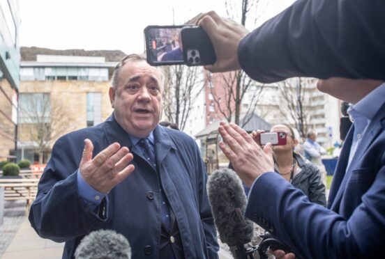 Alba Party Leader Alex Salmond speaks to the media outside the headquarters of the Scottish National Party (SNP) in Edinburgh following the arrest of former chief executive Peter Murrell. Police Scotland are conducting searches at a number of properties in connection with the ongoing investigation into the funding and finances of the party. Picture date: Wednesday April 5, 2023. PA Photo. See PA story POLICE SNP. Photo credit should read: Lesley Martin/PA Wire