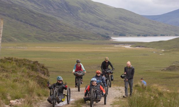 Perthshire filmmaker's new documentary charts amazing story of how three disabled adventurers cycle into the hills and stay overnight in a bothy - thanks to adaptive bikes. Image: Stefan Morrocco.