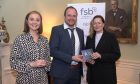 Steven and wife Amy Watt receiving their FSB Scotland Expansion and Growth Award for 2024 from Mairi McAllan MSP, Cabinet Secretary for Wellbeing Economy. Image: Supplied.