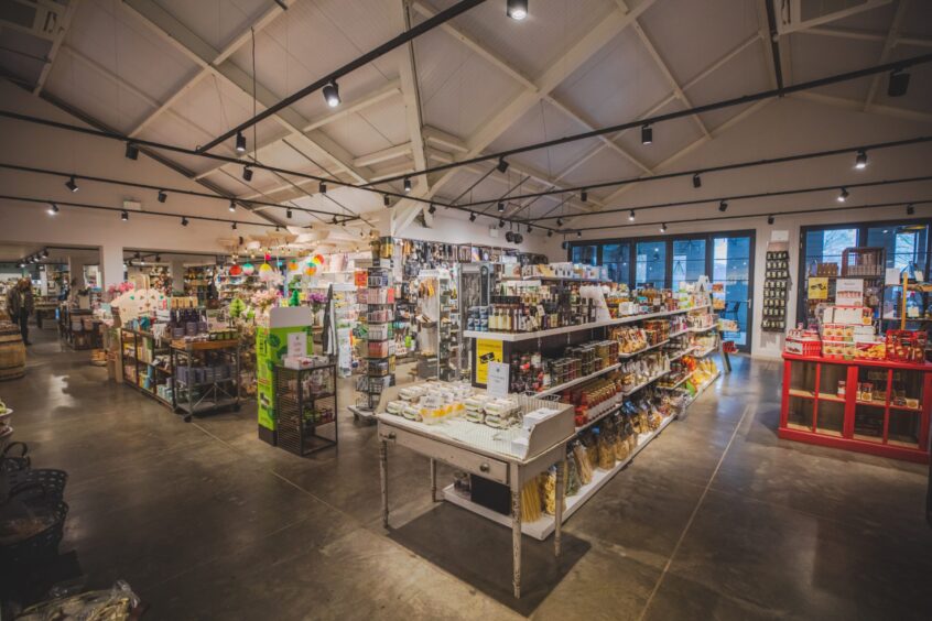 Loch Leven's Larder interior showing large, well stocked gifts department