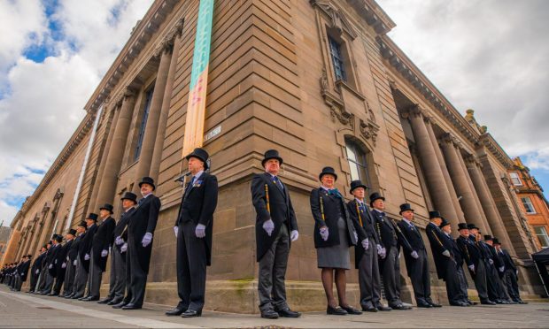 Society of High Constables of Perth standing guard outside Perth Museum, with one woman among their ranks
