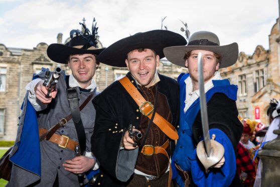 A group pose for a picture in St Andrews at the Kate Kennedy Procession. Image: Steve Brown/DC Thomson