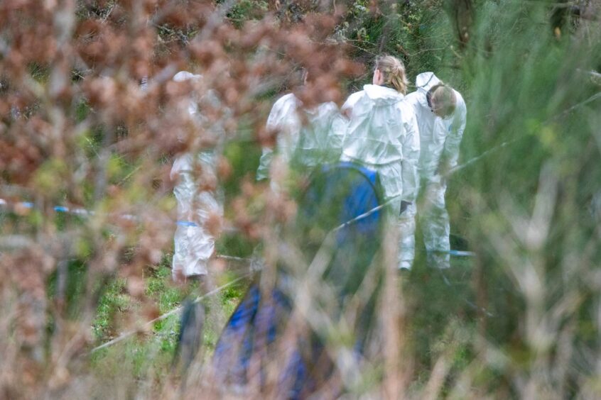 White-suited police forensic officers during the four-day search at Aunctermuchty Common.