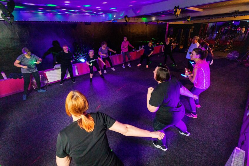 Class members working hard in Clubbercise at the new women-only gym in Fife