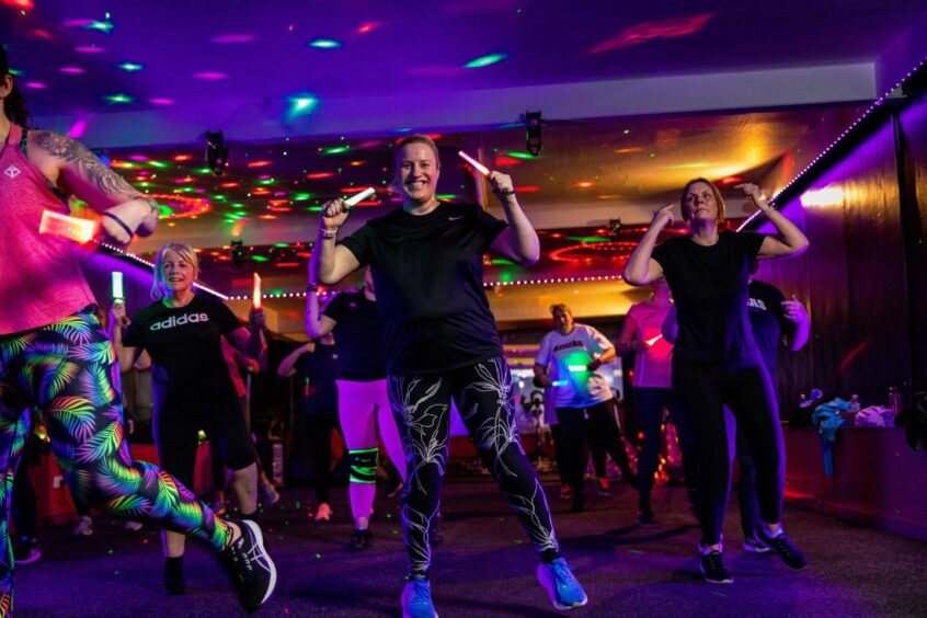 Debbie taking part in her first Clubbercise class at a women-only gym in Fife.