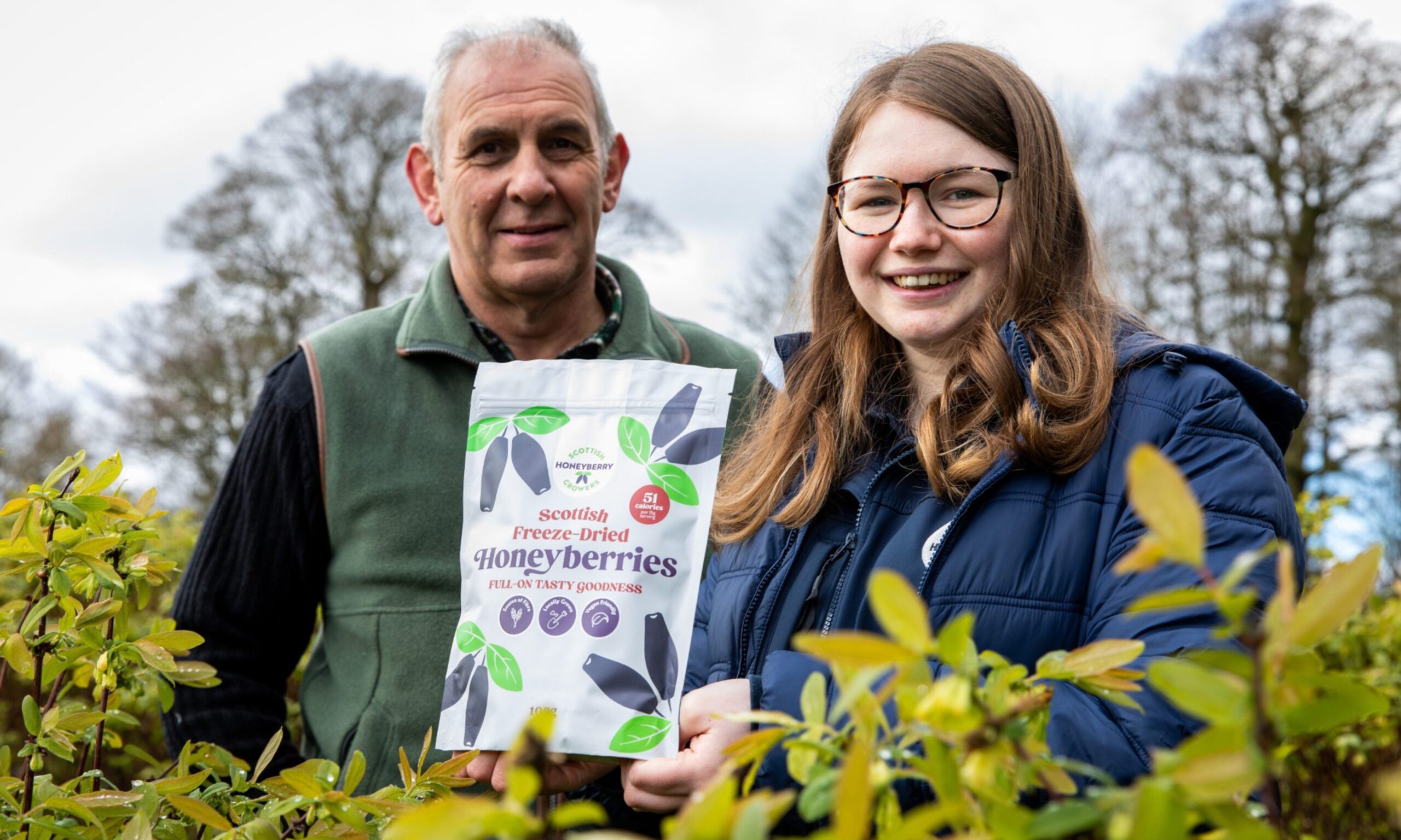 Chair of Scottish Honeyberry Growers, John Wilson alongside Catherine Sim in the honeyberry orchard near Cupar, Fife.