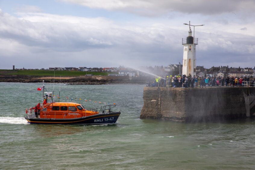 Large crowd welcomes new Shannon-class lifeboat to Anstruther.