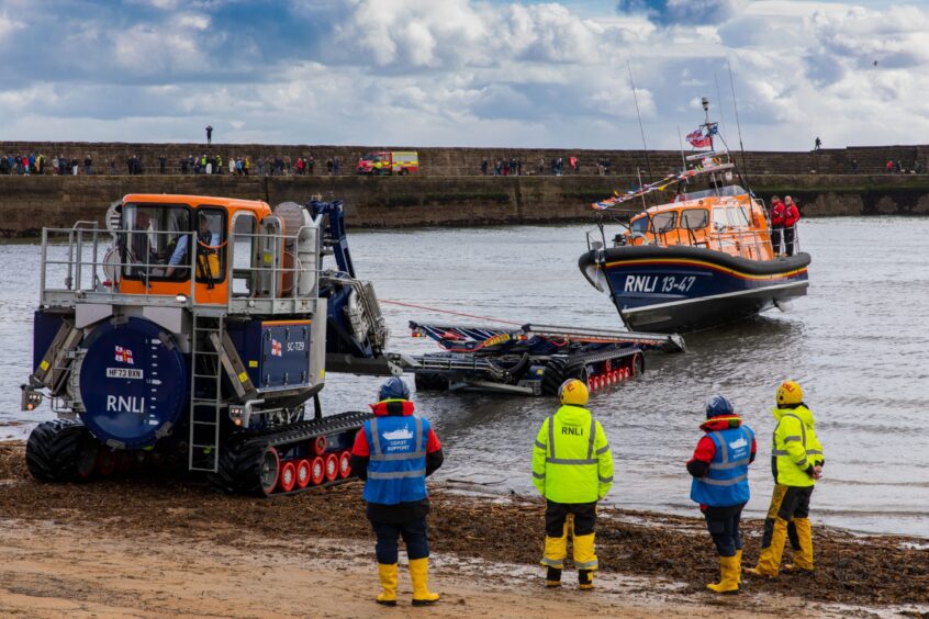 New Anstruther lifeboat winched ashore for the first time.