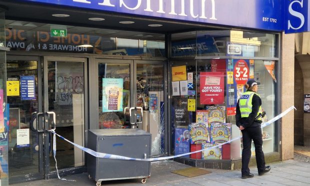 Police have taped off WHSmith in Dundee city centre. Image: Andrew Robson/DC Thomson