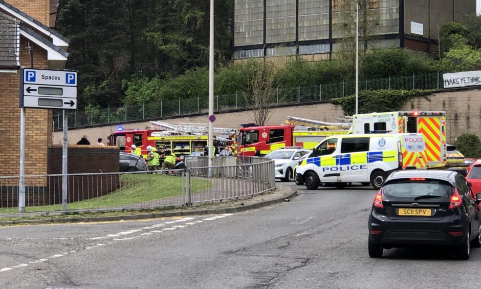 Emergency vehicles at the scene of the one car crash at Ladywell Roundabout in Dundee city centre