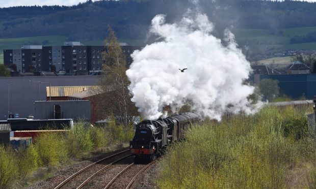 The Great Britain XVI steam train heads out of Perth on route to Inverness.
